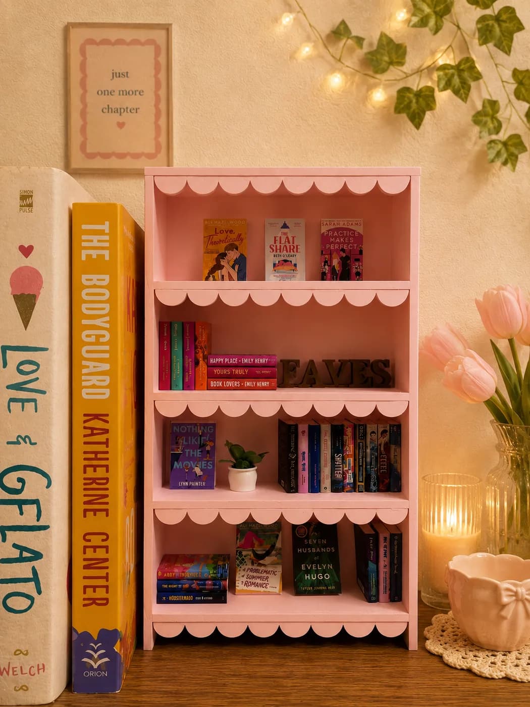 The Blush Pink Scalloped bookshelf styled with a FAVES topper, candles and tulips