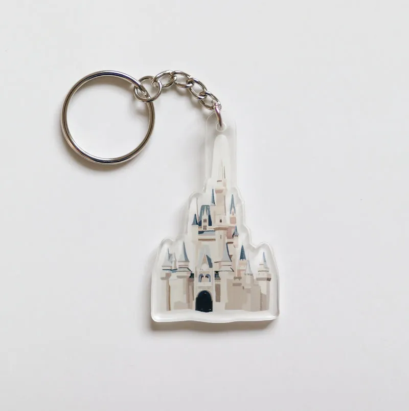 Castle library acrylic keychain laid flat on a white background