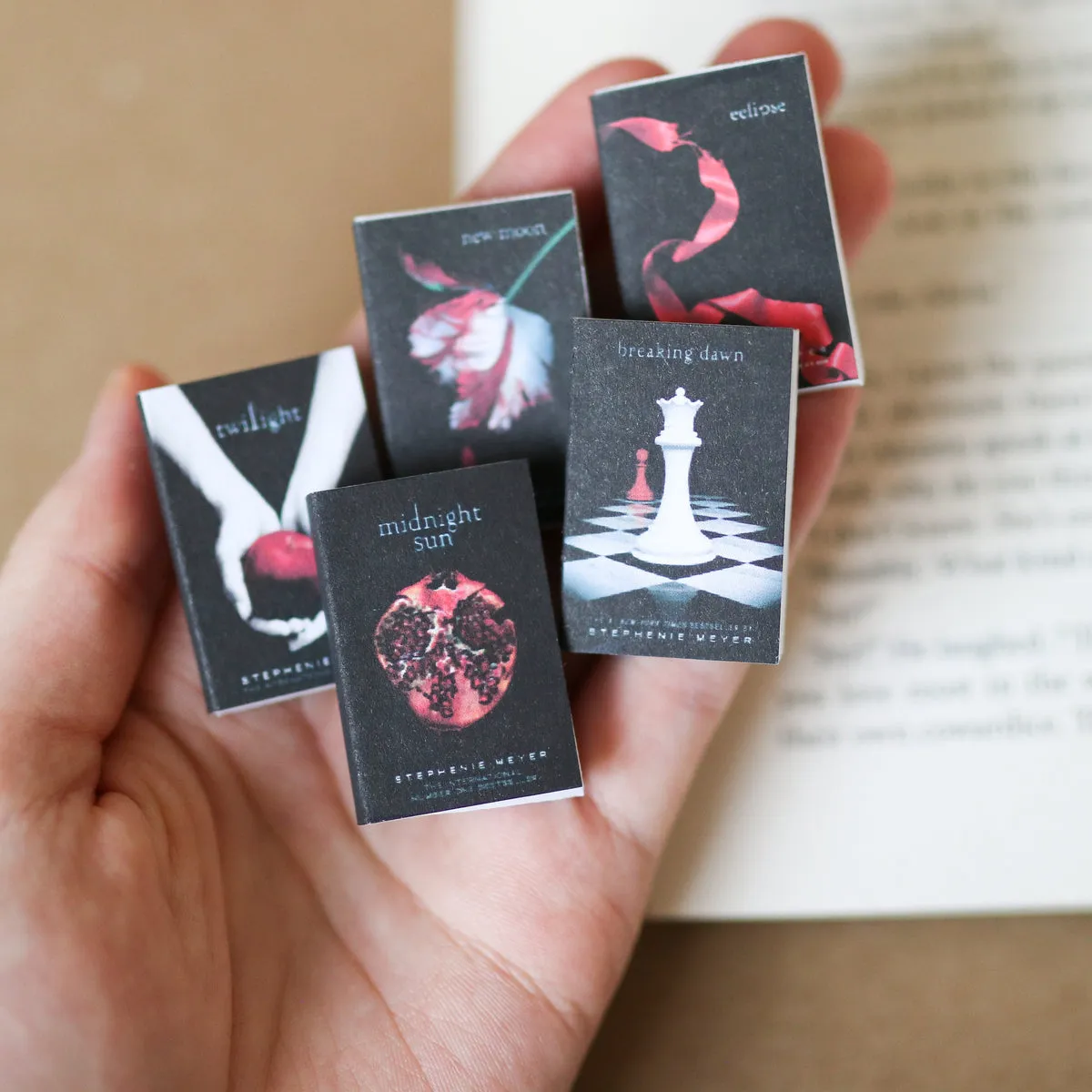 The mini Twilight saga fanned out across the pages of an open book