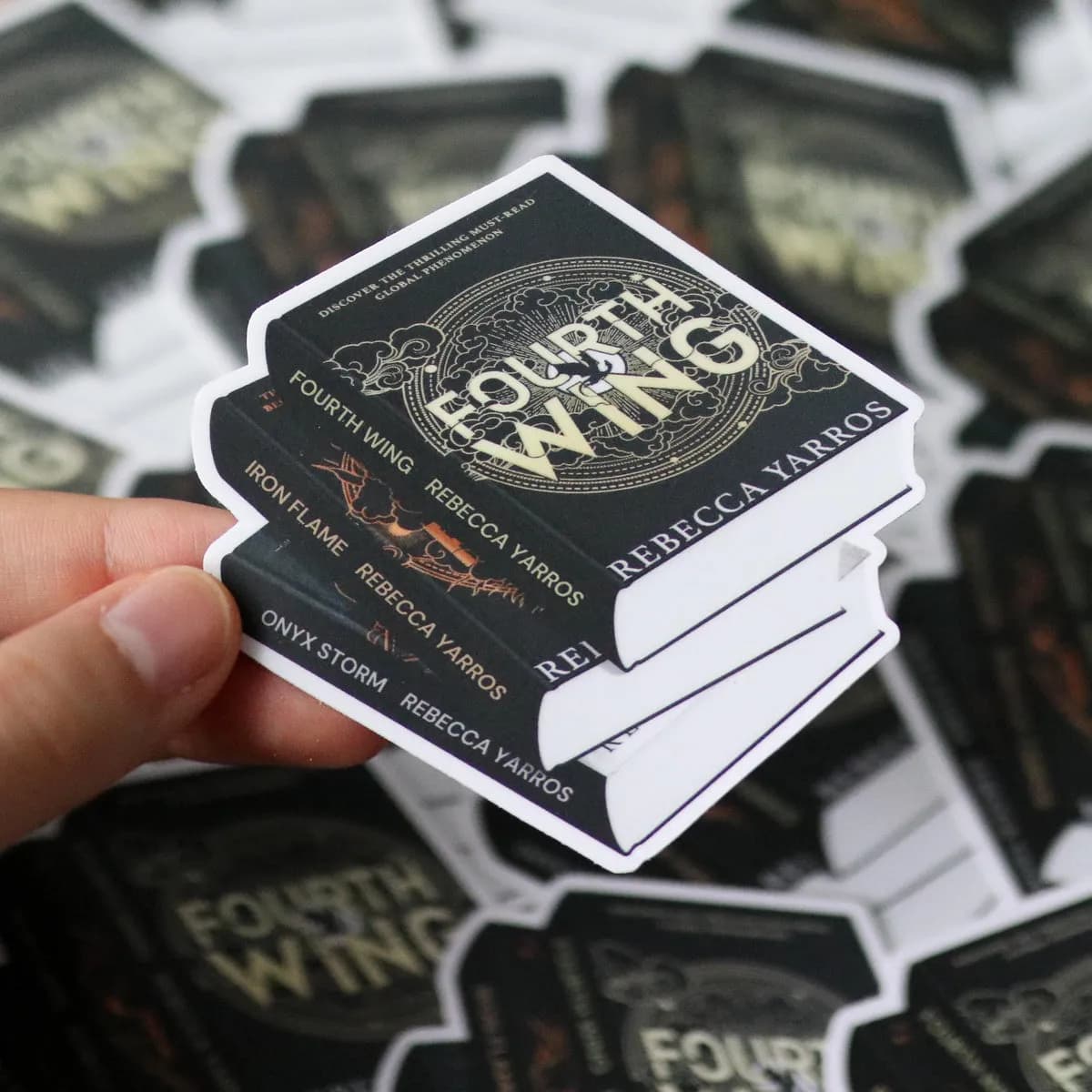Special Edition Fourth Wing Book Stack Sticker shown flat, every spine in the stack readable